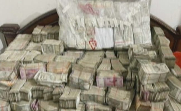 Heaps of cash found at Kolkata firm in ED raid, counting-machines busy ...